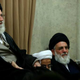 Khamenei, left, with Rouhani, far right.